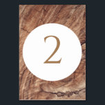 Rustikale Holzhochzeit Tischnummer<br><div class="desc">Dieses Design ist mit einem rustikalen Holzboden versehen. Der einfache, braune Holzhintergrund wird durch den weißen Text und das moderne, saubere mittlere kreisförmige Element ergänzt, das den Titel umgibt. Die Brauntöne des Holzkorns schaffen ein rustikales Waldgartengefühl. Elegante Hochzeitsstimmung mit modernen Elementen. Auch die passenden Hochzeitseinladungen und andere Schreibwaren sind verfügbar....</div>