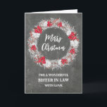 Rustikales Chalkboard Sister im Jura Weihnachten Karte<br><div class="desc">Frohe Weihnachten für die Schwester in der Rechtskarte mit rustikalem Country-Chalkboard-Muster und schneebedeckten Kranz mit Poinsettias.</div>