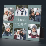 Rustikales Monogramm 6 Foto Collage Familienname a Fotoplatte<br><div class="desc">Eine Collage von sechs Fotos umgibt eine einfache anfängliche und rustikale Zweige zusammen mit einem Namen und einem Jahr. Macht ein großartiges Beigeschenk. Die Highlights Ihres Jahres, das Beste aus Ihrem Foto, Enkelfotos, Hochzeitsfotos und vieles mehr. Der weiche, aquamarine blaue Hintergrund ist die Standardeinstellung, aber andere Farben und Dekorgegenstände sind...</div>