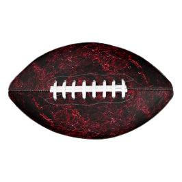 Rustikales schwammiges Rot auf dunkelrotem Hinterg Football