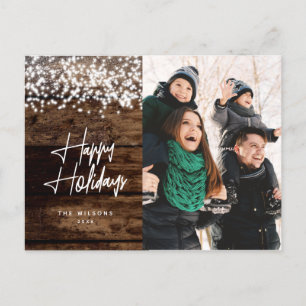 Rustikales Weihnachtsfest im Lande leuchtendes Fot Feiertagspostkarte