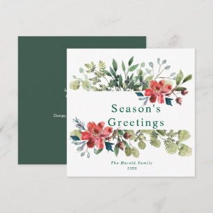 Rustikales Wintergrün mit roten Blume Feiertagskarte