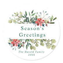 Rustikales Wintergrün mit roten Blume