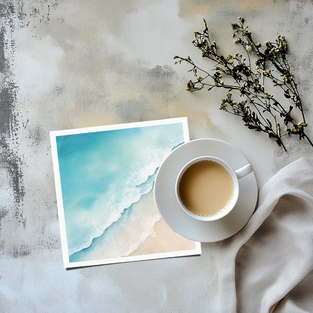 Sand und blaues Meer in Aquarellfarben Serviette (A napkin with a watercolor image of a sandy beach and light blue ocean)