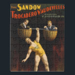 Sandow Eugen Sandow Vaudeville Weightlifter Puzzle<br><div class="desc">Treten Sie gleich hoch, Leute! Sehen Sie das Wunder der Moderne, der Koloss selbst aus Granit geschnitzt, Der Sandow! — Stärker als ein BullenElch, härter als ein Wagenrad, dieses deutsche Wunder ist nicht nur Muskel, er ist eine Symphonie der Kraft! Nun, die Trocadero Vaudevilles sind nicht dein altes, staubiges Opernhaus,...</div>
