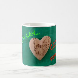 Sankt-Katze, die nach Plätzchen-Tasse sucht Tasse
