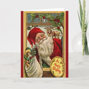 Santa am Fenster mit Spielzeug-Grußkarte Feiertagskarte
