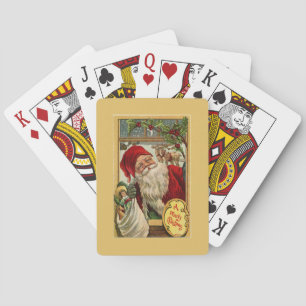 Santa am Fenster mit Spielzeugtasche Gold Spielkarten