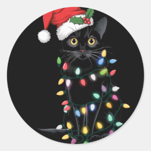 Santa Black Cat hallte in Weihnachtsbaumlicht auf Runder Aufkleber