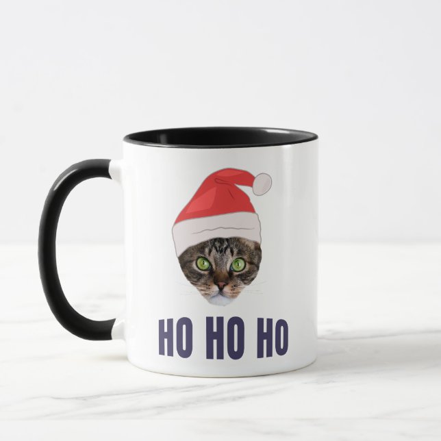 Santa Cat mit Weihnachtsmannmütze, Ho Ho ho Einlad Tasse (Links)