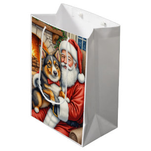 Santa Claus hält Australian Shepherd Weihnachten Mittlere Geschenktüte