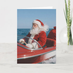Santa Claus liefert Geschenke per Schnellboot Karte
