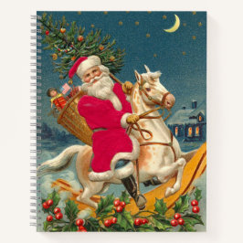Santa Claus on a wooden horse Notizbuch