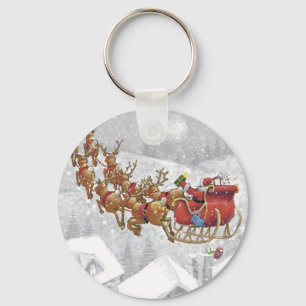 Santa Claus riding on sleigh with gift box Schlüsselanhänger