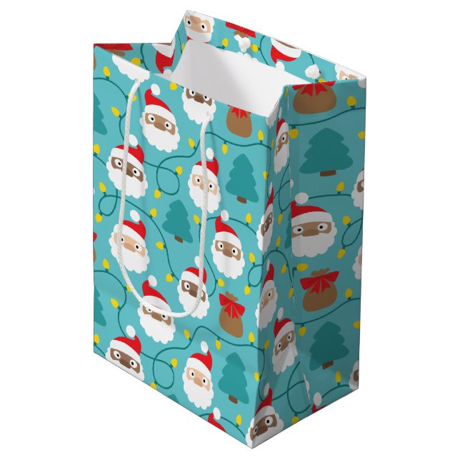 Santa Clauses Muster Mittlere Geschenktüte (Vorderseite Schrägansicht)