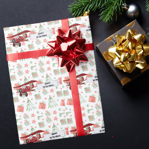 Santa fliegt Flugzeug, erstes Weihnachten personal Geschenkpapier