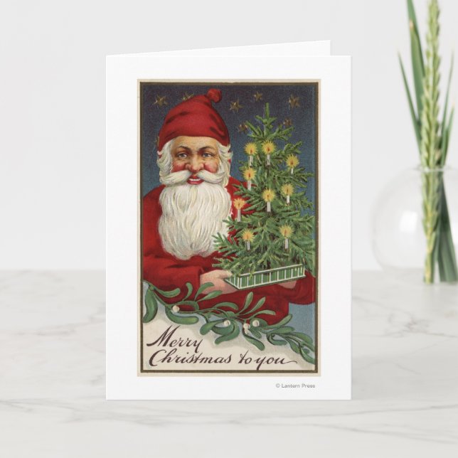 Santa Holding a Candlelit Tree Feiertagskarte (Vorderseite)