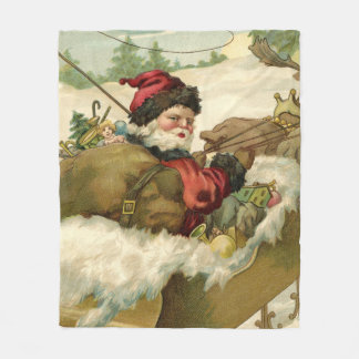 Santa in seinem Schlitten Fleecedecke