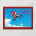 Santa-Klausel, die hoch fliegt und eine Hand schna Feiertagspostkarte<br><div class="desc">Santa Clause zeigt seine Freestyle-Motocross-Fähigkeiten</div>