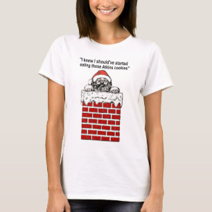 Santa klebte in einem Kamin-Shirt T-Shirt