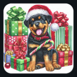 Santa Paws: Candy Cane Bandit! Quadratischer Aufkleber<br><div class="desc">Machen Sie sich bereit für einen poppigen Urlaub Spaß! Dieser bezaubernde Rottweiler-Welpe rockt eine festliche Weihnachtsmannmütze und ist umgeben von farbenfrohen, bandförmigen Geschenken, die Weihnachtsmagie schreien. Mit einem großen, fröhlichen Zungengrin und einem Bonbonbon in Pfote ist dieses spielerische Jungtier der perfekte Urlaubsfreund für Kinder, die Liebe und Weihnachten jubeln! Helle...</div>