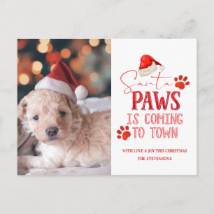 Santa Paws kommt zu Weihnachtsfotos in der Stadt Feiertagspostkarte