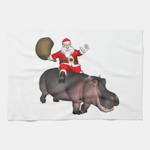 Santa Riding auf Hippo Handtuch