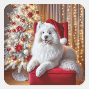Santa Samoyed Hund auf einem roten Stuhl Quadratischer Aufkleber