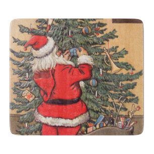 Santa schmückt Weihnachtsbaum Schneidebrett