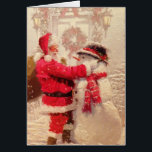 Santa & Snowman Grußkarte<br><div class="desc">Ho Ho Ho! Es ist Weihnachten und der Weihnachtsmann ist Gebäude ein Schneemann. Nostalgischer Blick auf dieses fantastische Urlaubsbild. In der Karte steht "Frohe Weihnachten!"</div>