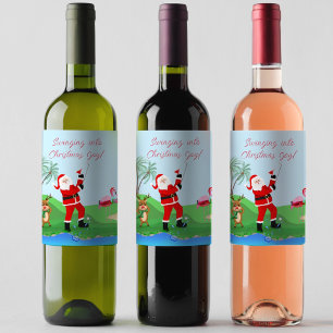 Santa spielt Golf im Wasser mit Martini-Party Weinetikett