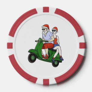 Santa und Frau Claus fahren mit einem Roller Pokerchips