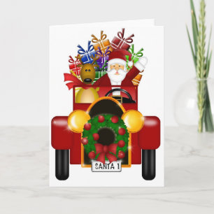 Santa und Rentiere in rotem Antiquitäten-Auto mit  Feiertagskarte