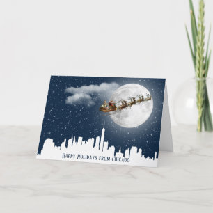 Santa und Sleigh fliegen über die Skyline der Groß Karte