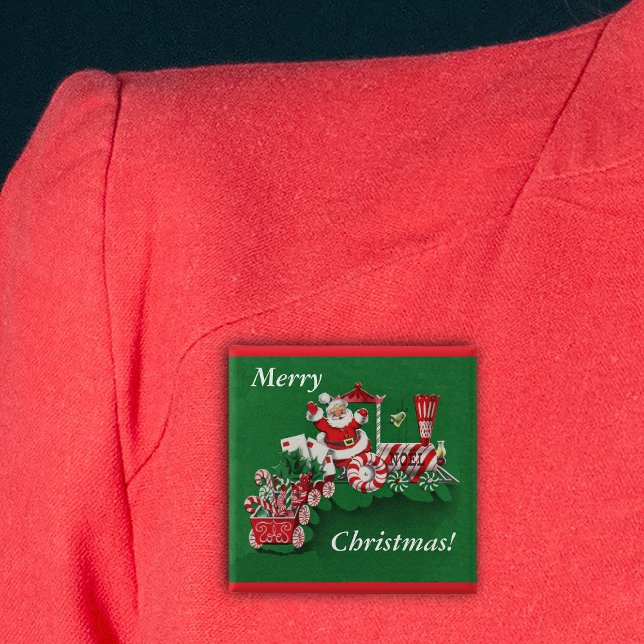 Santa-Weihnachtszug-Knopf Button (Santa riding train peppermint candy wheels candy canes Merry Christmas green pin back button.)