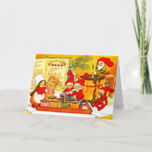 Santas kleine Helfer machen Schokoladenkuchen Feiertagskarte