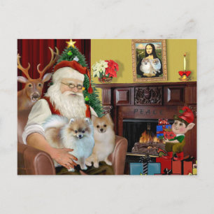 Santas zwei Pomeranians Feiertagspostkarte