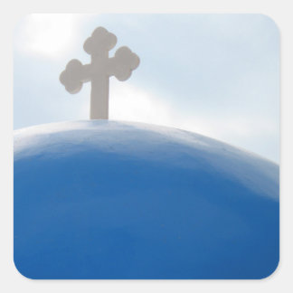 Santorini Kreuz in der Nachmittagssonne Quadratischer Aufkleber