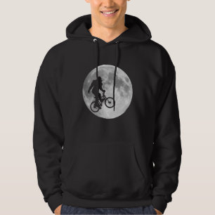 Sasquatch Bigfoot auf Fahrrad im Himmel mit Hoodie