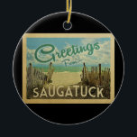 Saugatuck Beach Vintage Keramik Ornament<br><div class="desc">Diese Gruß-Von Saugatuck Vintage Postcard-Design zeichnet sich durch einen Sandstrand mit türkisblauem Meerwasser und über dem Meer aus,  einen blauen Himmel mit duftigen weißen Wolken. Im Vintage Reisen Stil.</div>