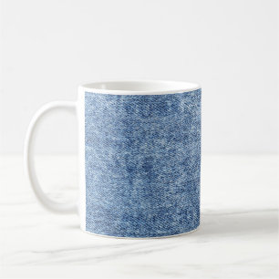 Säuregewaschenes blaues Denim, Nahaufnahme-Textur. Kaffeetasse