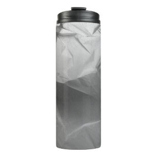 Schatten aus zerbrochenem Papier Thermosbecher