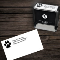 Schattenriss eines Katzenpfotenabdrucks