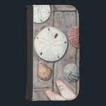 Schätze an der Küste Galaxy S4 Geldbeutel Hülle<br><div class="desc">Megan Meagher ist bekannt für ihre einfachen Kunstwerke. Dieses Bild zeigt die Einfachheit der Schätze der Küste,  einschließlich Sand Dollars und Muscheln in einem pastellfarbenen Ton. Meagher umschließt einen hölzernen Hintergrund in ihrem Bild,  um diese Schätze zu kontrastieren. Holen Sie sich diesen Kunstdruck heute auf Holzfarbe auf Ihrem Zazzle-Produkt.</div>