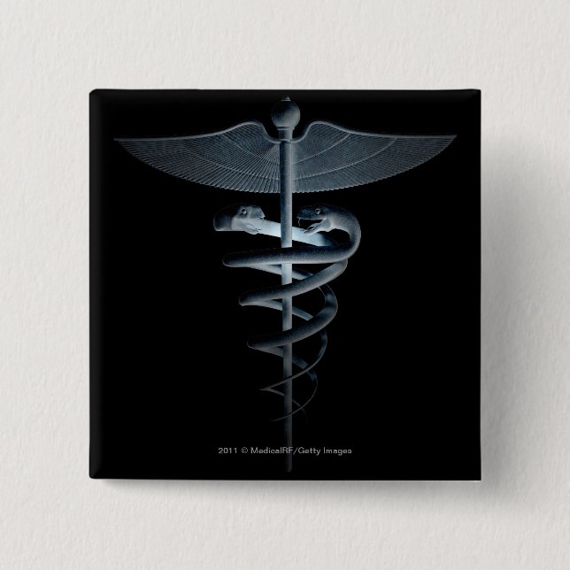 Scheinwerfer auf einem medizinischen Caduceus Button (Vorderseite)