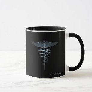 Scheinwerfer auf einem medizinischen Caduceus Tasse