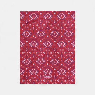 Schicke farbenfrohe rote und violette Ikat-Stammes Fleecedecke