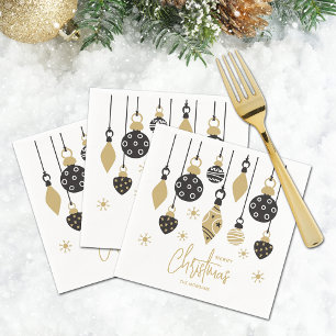 Schicke schwarze und goldene Weihnachtsdekoratione Serviette