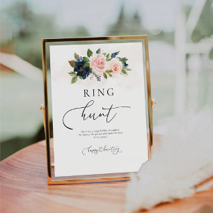 Schild mit dem rosafarbenen Blumenring