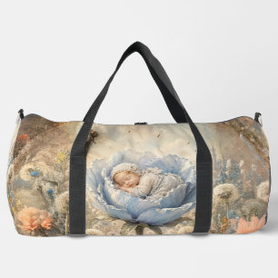 Schlafendes Baby in blauem Blumen-Baby Duffle Bag